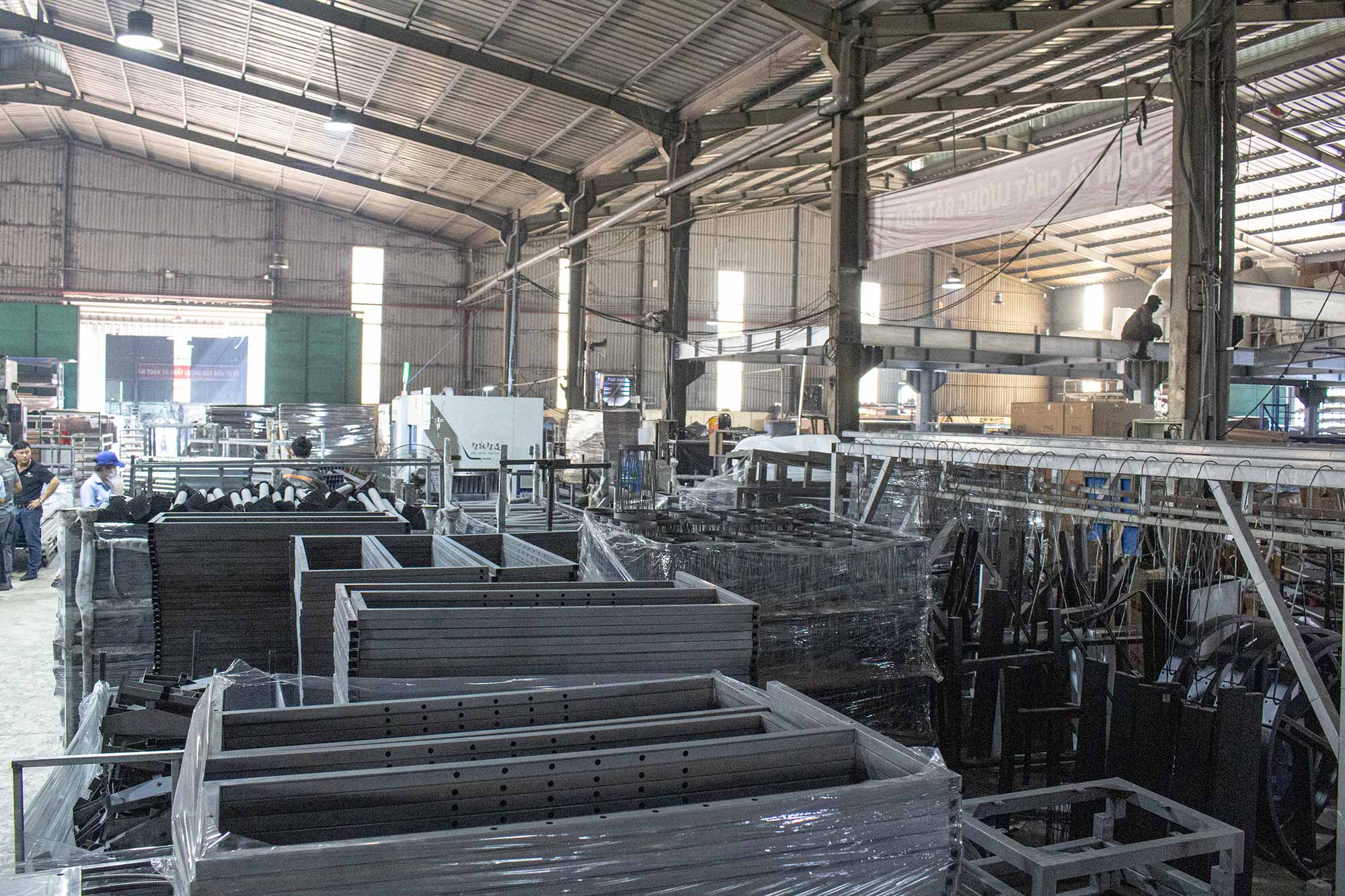Metal furniture manufacturing facility in Vietnam showing large scale production and factory operations