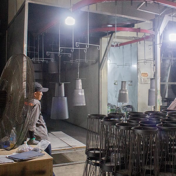 Metal furniture surface finishing process showing powder coating for protection and aesthetic quality