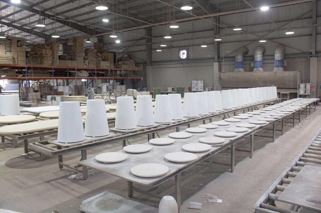 MOQ in furniture manufacturing illustrated by a batch production line in a Vietnam furniture factory