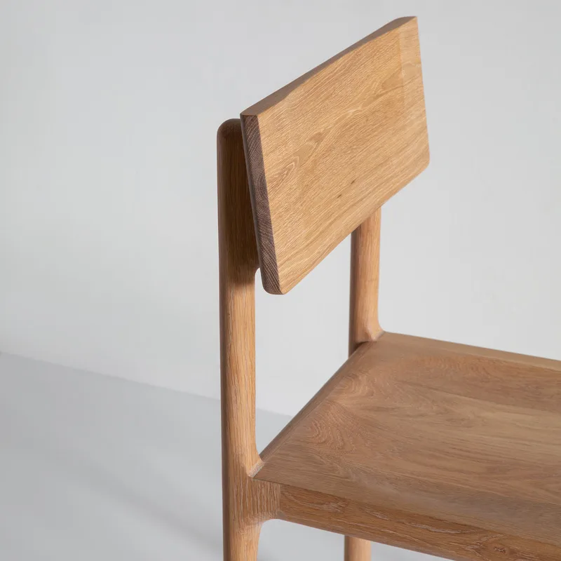 Minimalist Solid Wood Dining Chair with Sculpted Seat and Rectangular Backrest